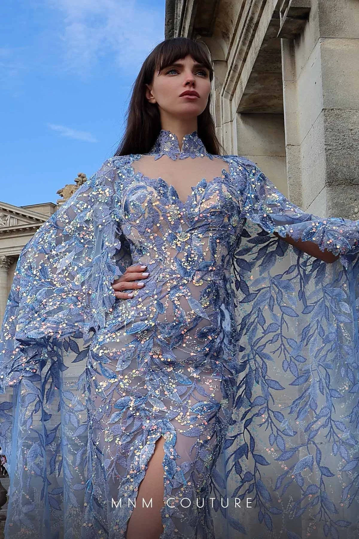 MNM Couture K4012 Blue Sheer Embellished Gown with Cape Sleeves - Image 3